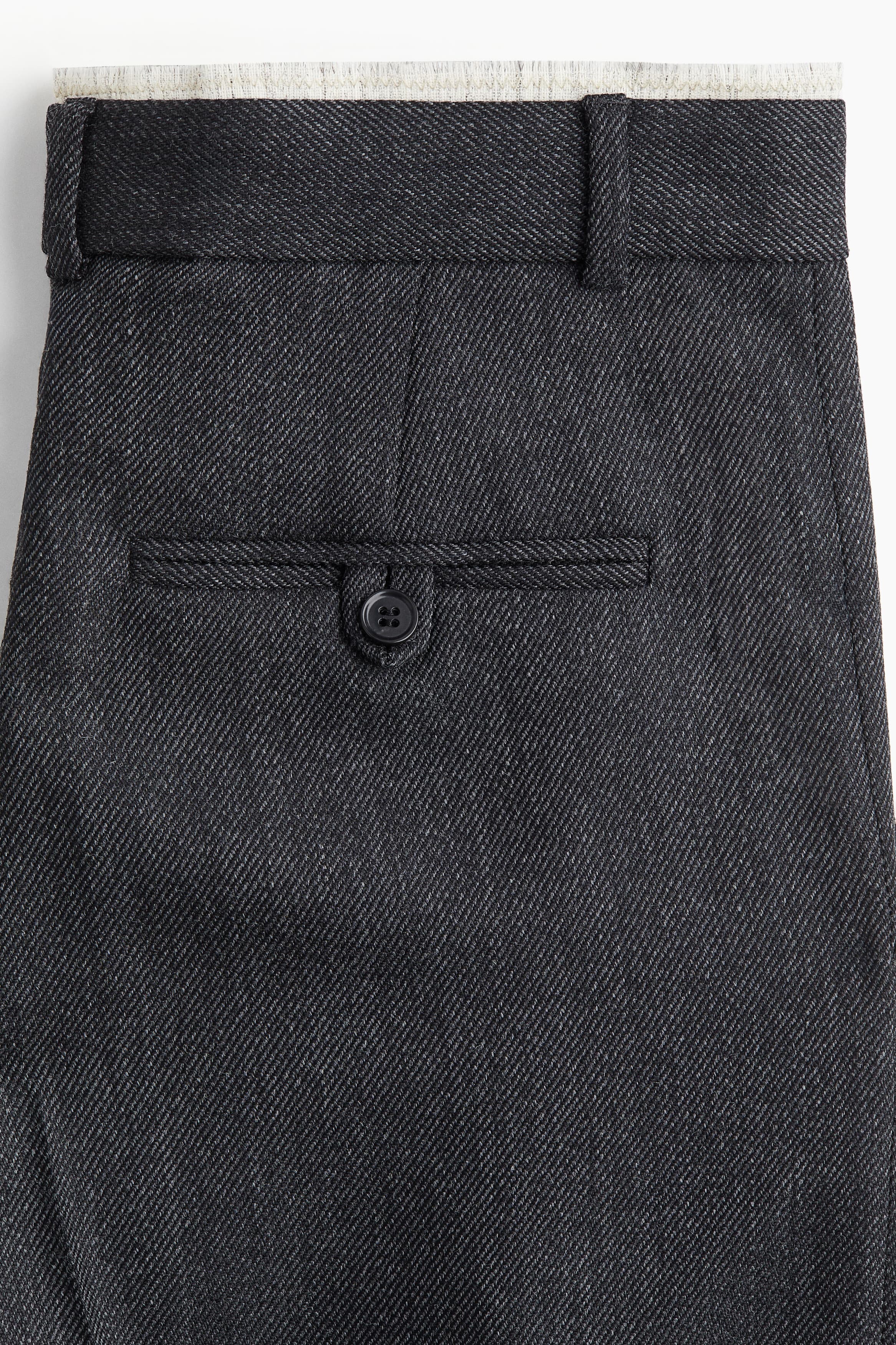 Шерстяные брюки с низкой посадкой на молнии: детали изделия