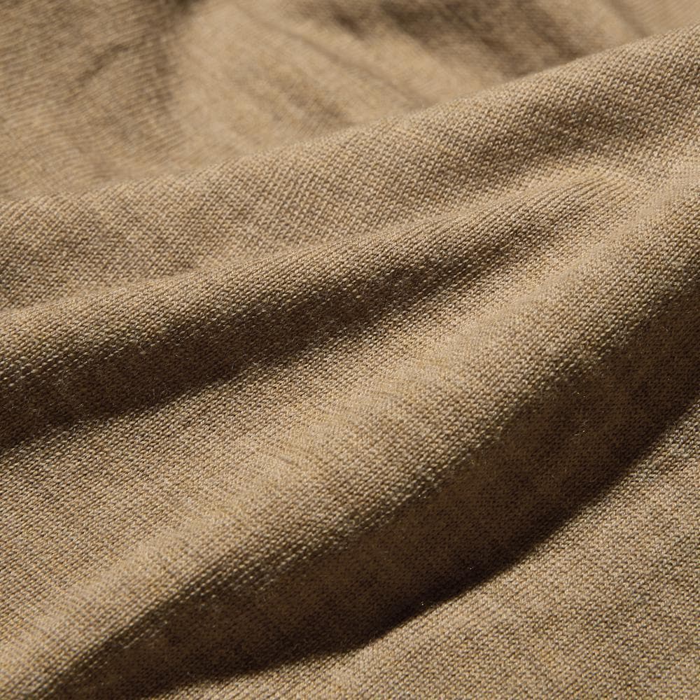 Мериносовое поло с длинным рукавом: особенности модели